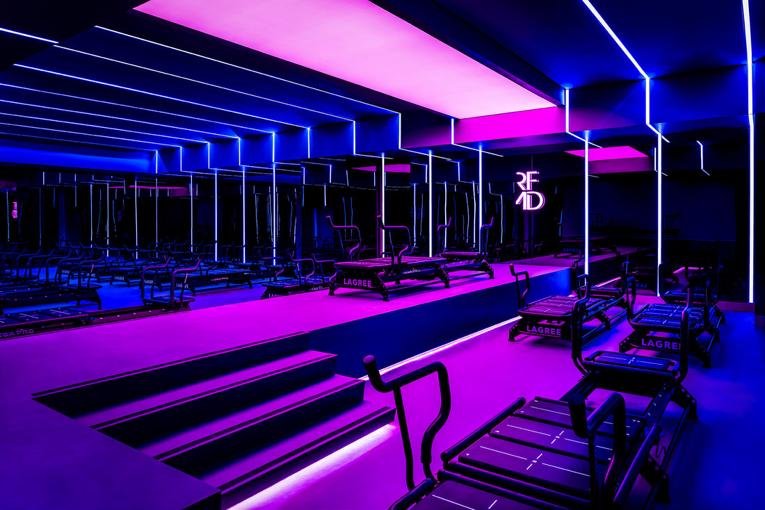 Gym interior with purple and blue neon lights